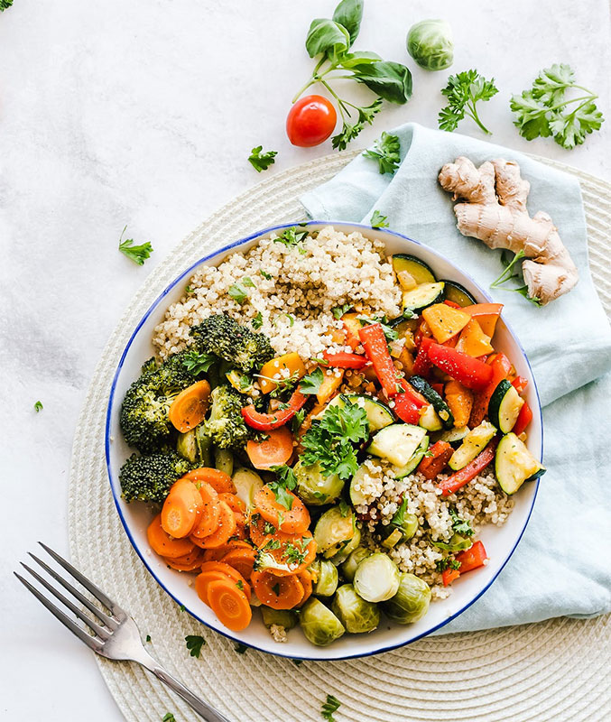 overhead view of grains and vegetables on a plate